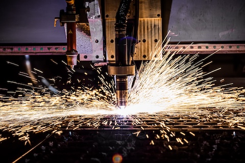 Plasma steel cutting machine in action